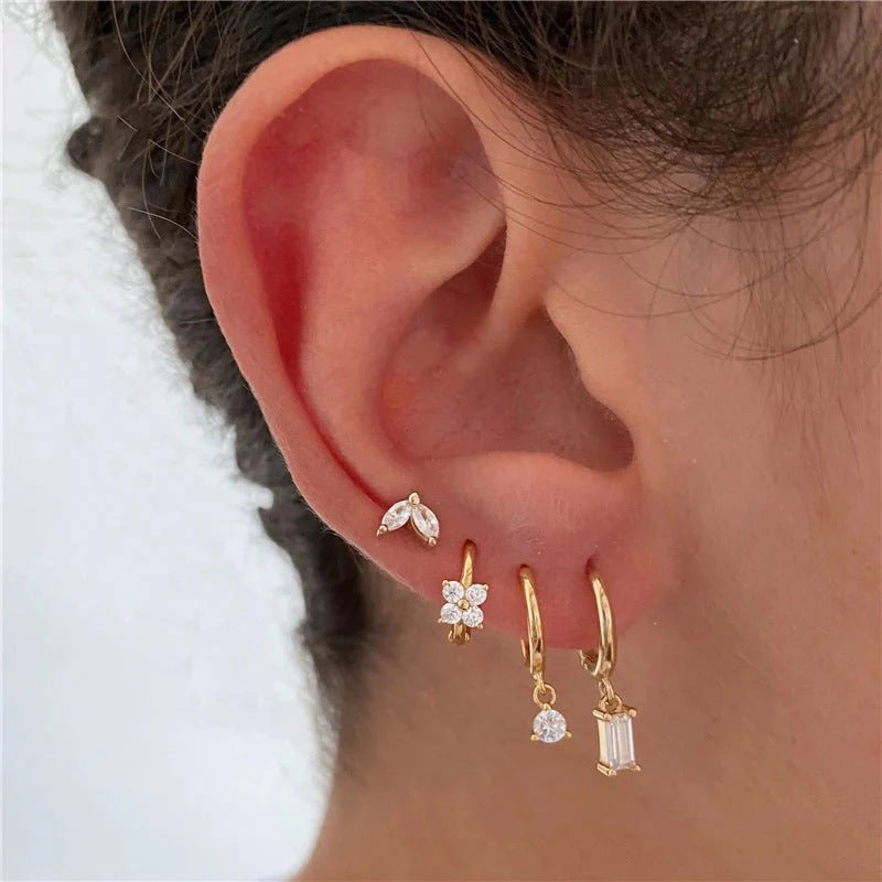Women’s geometric flower earrings adorned with sparkling zircon stones.